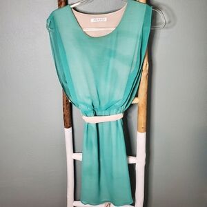 Green dress with light pink liner & tie waist